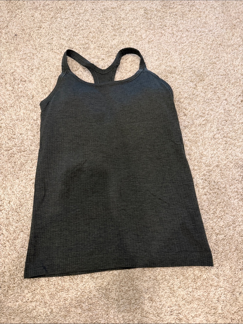 Lululemon Ebb to Street Tank. Size 6. Green color. Excellent condition